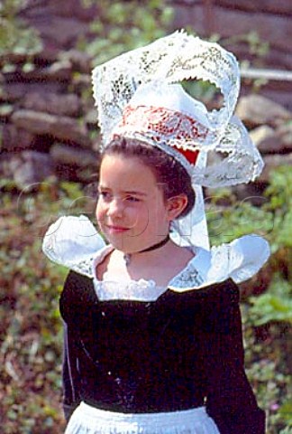 Girl wearing Coiffe and tradional   Breton costume