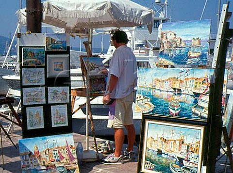 Artists painting on the quayside at St Tropez  ProvenceAlpesCte dAzur