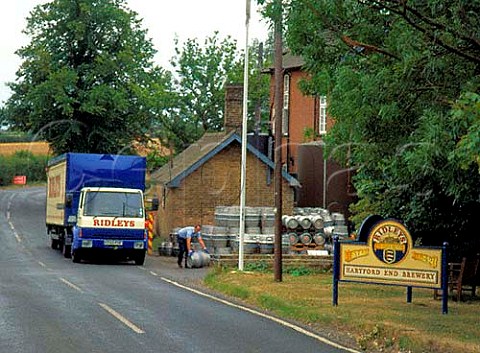Unloading empty kegs from lorry at Ridleys Brewery   Hartford End Essex England