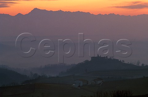 Dusk over the vineyards near Monforte   dAlba with the Alps in the distance   Piemonte Italy