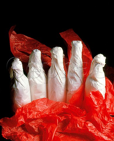 Bottles wrapped in tissue paper
