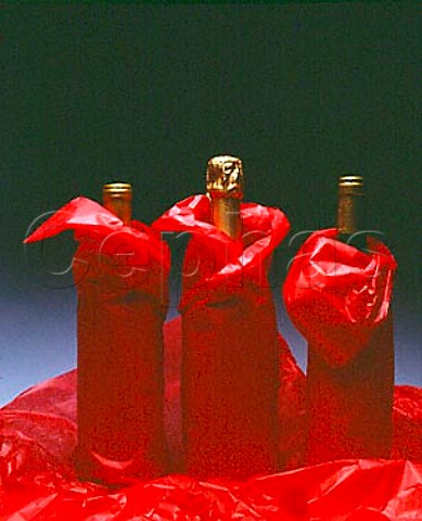 Bottles of wine wrapped in tissue paper