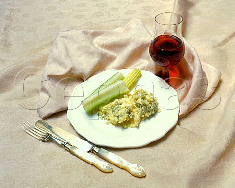 Plate of Stilton cheese and celery with glass of   Taylors 20 year old port