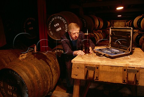 Checking alcohol level after maturation   in oak casks Macallan Distillery   Craigellachie Banffshire Scotland