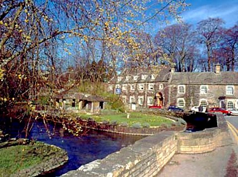 The Swan Hotel and River Colne at   Bibury Gloucestershire England