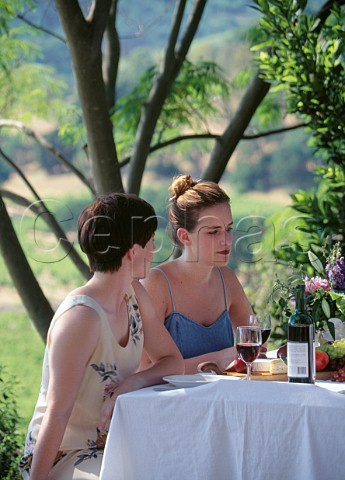 Women dining on the terrace of Joseph Phelps Winery St Helena Napa Valley California