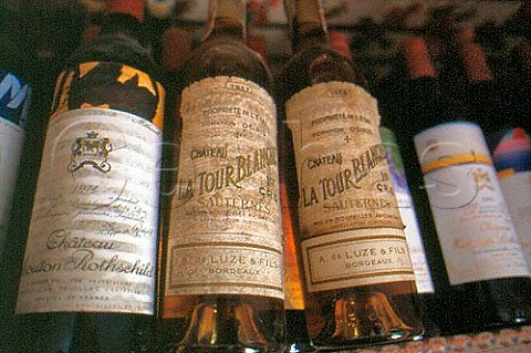 Bottles of Chateau MoutonRothschild and   Chateau La Tour Blanche