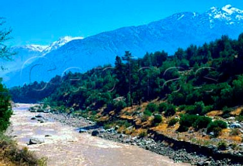 The Maipo River flowing through the foothills of the   Andes  Chile