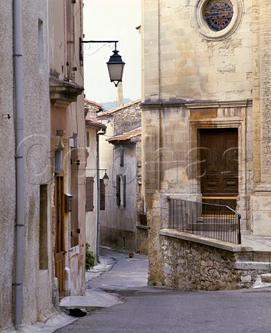 Street by the church in the wine town of Tavel Gard France