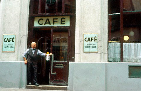 Mr Hawelka at entrance to   Caf Hawelka Vienna Austria