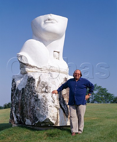 Maurizio Zanella with Igor Mitorajs sculpture Eroi di Luce Heroes of Light in the grounds of his estate Cadel Bosco   Erbusco Lombardy Italy  Franciacorta