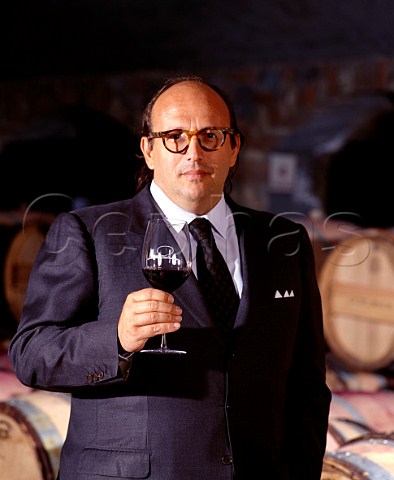 Maurizio Zanella tastes his signature wine  a   Bordeaux style blend of Cabernet Sauvignon Merlot   and Cabernet Franc  maturing in barrique in his   cellars   Cadel Bosco Erbusco Lombardy Italy Franciacorta