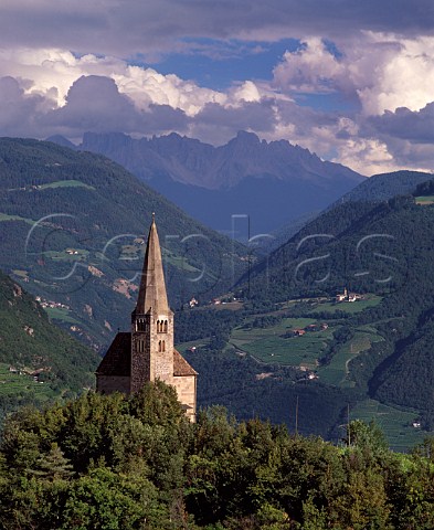 The church of San Giorgio high above Bolzano amidst vineyards in the Santa Maddalena zone with the Isarco Valley and Dolomites beyond Alto Adige Italy    Santa Maddalena DOC