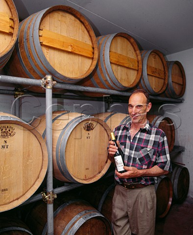 Giovanni Poli with his acclaimed Vino Santo made from the Nosiola grape  a speciality of the Valle dei Laghi region  Santa Massenza Trentino Italy