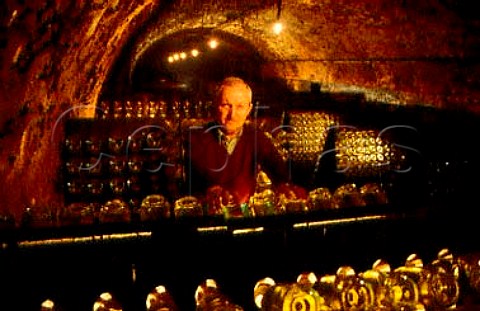 Performing the remuage on bottles of   Sekt in the cellars of Schlumberger   Vienna Austria