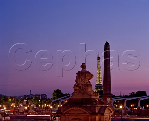 The 3200 yearold Luxor Obelisk in the Place de la  Concorde with the Eiffel Tower beyond Paris  France