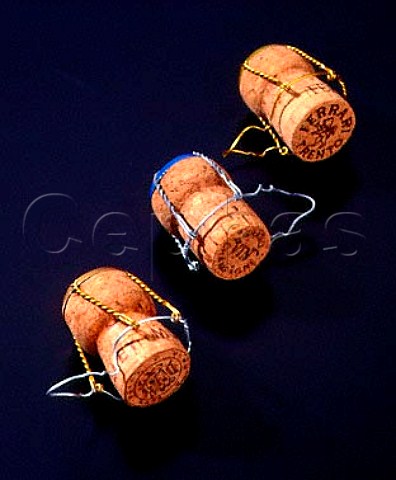 3 sparkling wine corks  Mumm Cuve Napa  California Ferrari Trento Italy   and Champagne
