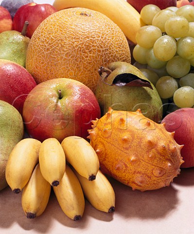 Assorted fruit  bananas melons grapes pears   peaches nectarines figs