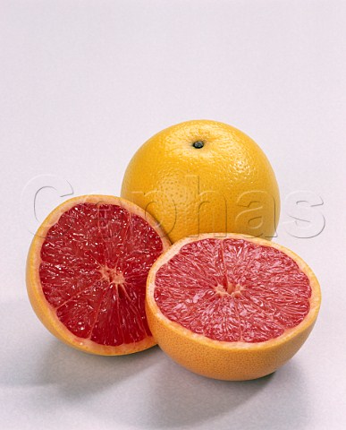 Whole Grapefruit and halved Florida Red Grapefruit