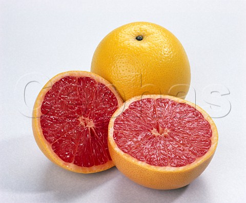 Whole Grapefruit and halved Florida Red Grapefruit