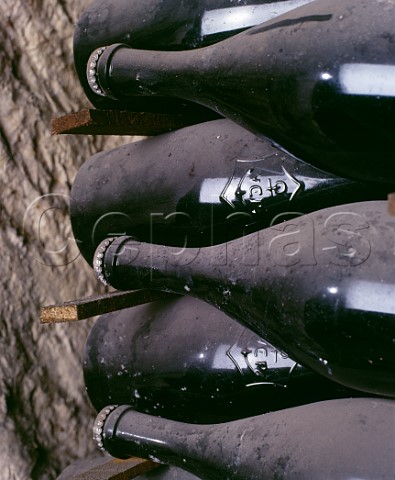 Bottles of La Grande Dame lying sur lattes in the cellars of Veuve Clicquot Ponsardin in their GalloRoman chalk quarries crayres Reims Marne France  Champagne