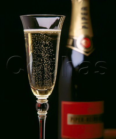 Bottle and glass of Piper Heidsieck champagne