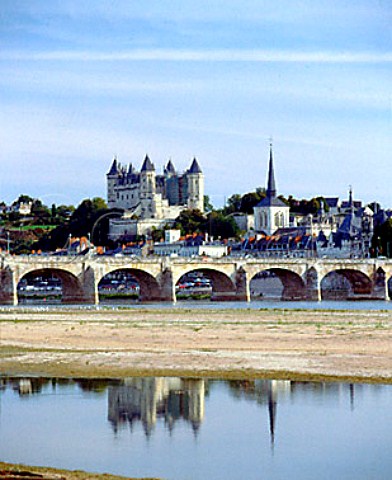 The 14thcentury Chteau de Saumur and spire of   St Pierre viewed over the River Loire  Saumur  MaineetLoire France  Pays de la Loire