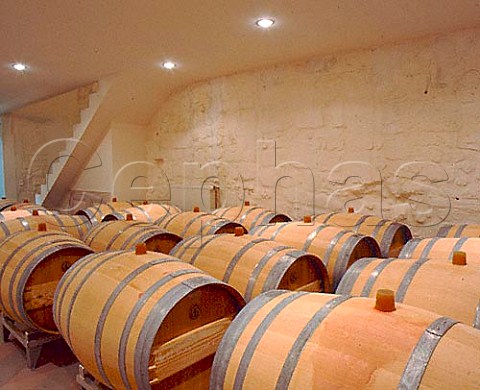 New oak barriques hold wine undergoing the   malolactic fermentation in the chais   of Chteau de Valandraud Stmilion   Gironde France