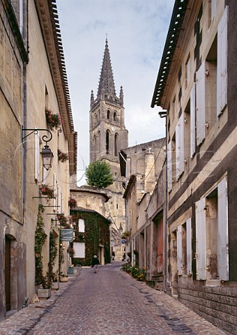 View up Rue de la Petite Fontaine towards the belltower of the church Stmilion Gironde France