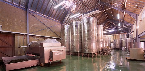 Bladder press and refrigerated stainless steel tanks of Denbies Winery Dorking Surrey England