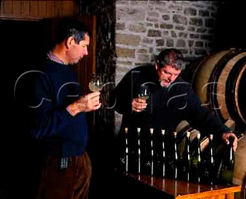 HIRES NOT AVAILABLE Pierre Morey matre de chai tasting barrel samples with Jean Jafflin his chef de caves  Domaine   Leflaive PulignyMontrachet Cte dOr France