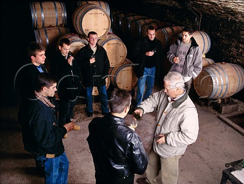 Jacques Seysses is very influential among younger   winemakers in Burgundy Here he   conducts a tasting for some of them in his cellars    Domaine Dujac MoreyStDenis   Cte dOr France