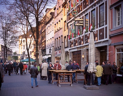 Drinking outside the Zum Schlussel bar on Flinger   Strasse Dsseldorf NordrheinWestfalen Germany