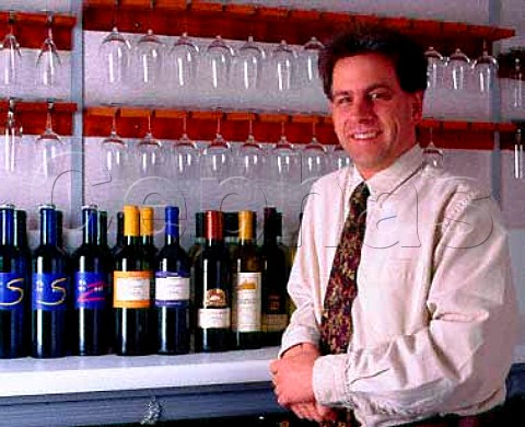 Kym Milne MW flying winemaker with some of the   southern Italian wines that he makes for   International Wine Services
