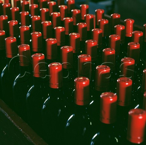 Capsules on bottles ready for heat shrinking Chteau CroizetBages Pauillac Gironde France Mdoc  Bordeaux