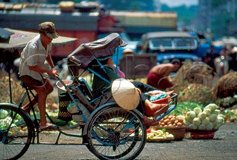 Rickshaw in Cho Lon Market Saigon   Vietnam