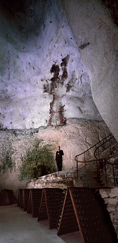 JeanFranois Barot now retired in one of the crayres   4thcentury GalloRoman chalk quarries of  Champagne Ruinart   Reims Marne France