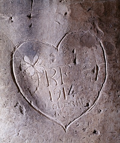 Graffito in the chalk cellars of Champagne Taittinger dated 1914 from when French soldiers were sheltering from bombing Reims Marne France