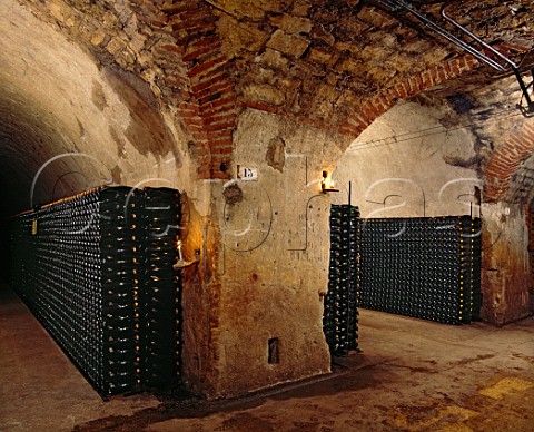 Bottles of Champagne ageing sur lattes in the cellars of Alfred Gratien pernay Marne France