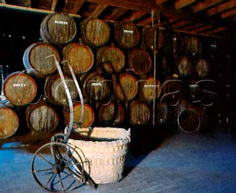 Barrels and grape basket in the museum of   Champagne Alfred Gratien pernay Marne France