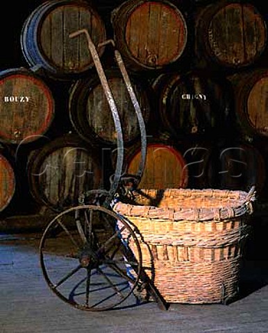 Barrels and grape basket in the museum of   Champagne Alfred Gratien pernay Marne France