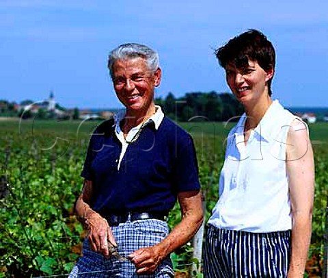 Nadine mother and Claude Nicolay of   Domaine Chandon de Briailles in their   Fourneaux vineyard SavignylsBeaune   Cte dOr France