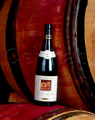 Bottle of 1995 CteRtie La Landonne in the barrel   cellar of Guigal Ampuis Rhne France