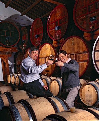 JeanPierre left and Franois Perrin in the barrel   cellar of Chteau de Beaucastel  Courthzon Vaucluse France  ChteauneufduPape