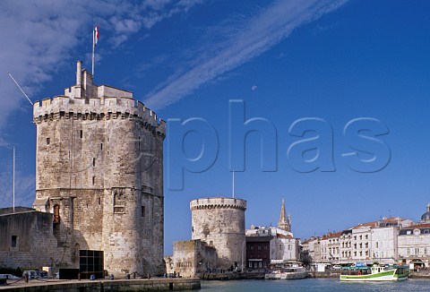 The Towers of StNicholas and La Chaine at the entrance to the ancient port of La Rochelle CharenteMaritime France  PoitouCharentes