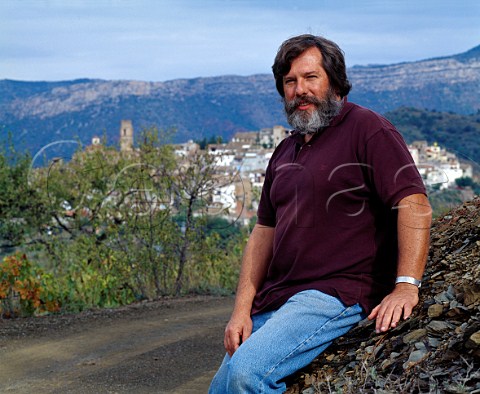 Ren Barbier of Clos Mogador sitting on a bank of schist  the principal soil type of the region  in his vineyards at Gratallops Catalonia Spain  DO Priorato