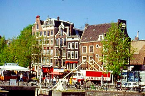 Sluis or lock with herring stall beer   lorry and old gabled houses Amsterdam     Netherlands