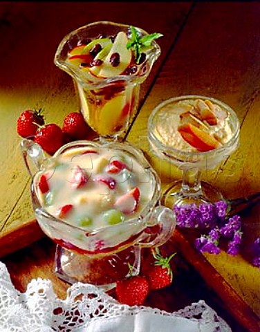 Autumn fruit compote spiced apricot mousse and hot   trifle in a glass