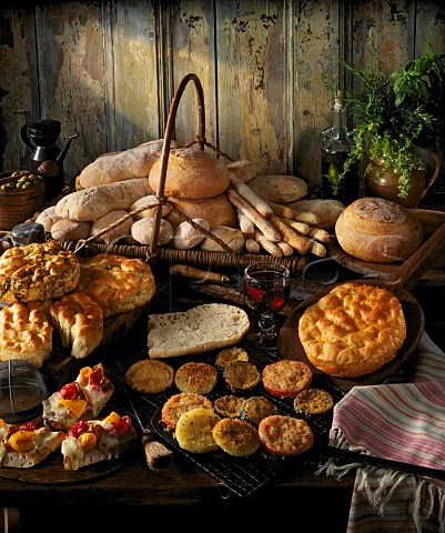 Bread Assorted Bread  Herb Foccias Ciabatta   Sesame seed sticks etc with baked herb vegetables