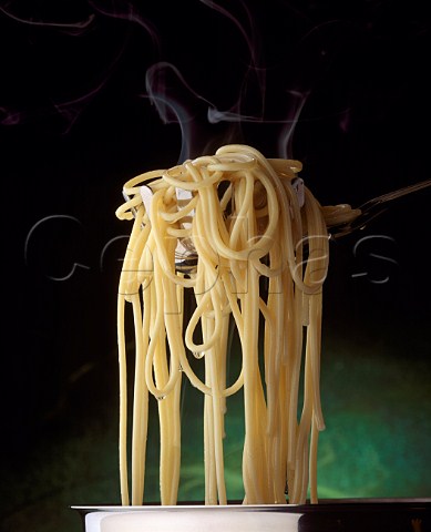 Pasta Spaghetti hanging from a server